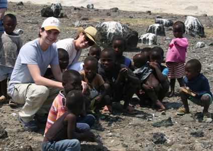 Bocconi students with children in Kenya