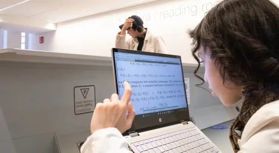 female student using a special laptop